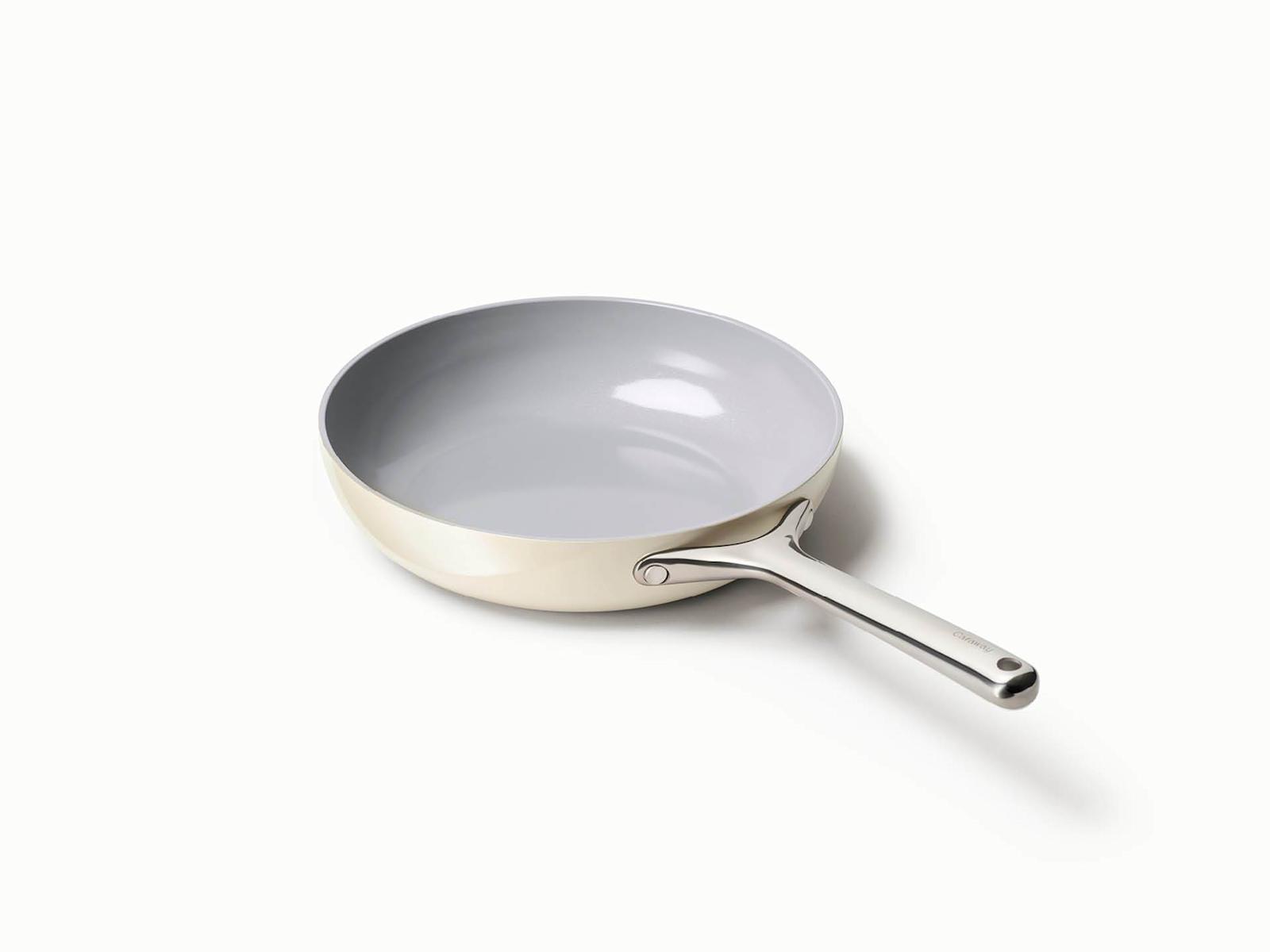 Flat studio product shot of a ceramic fry pan before AI enhancement.